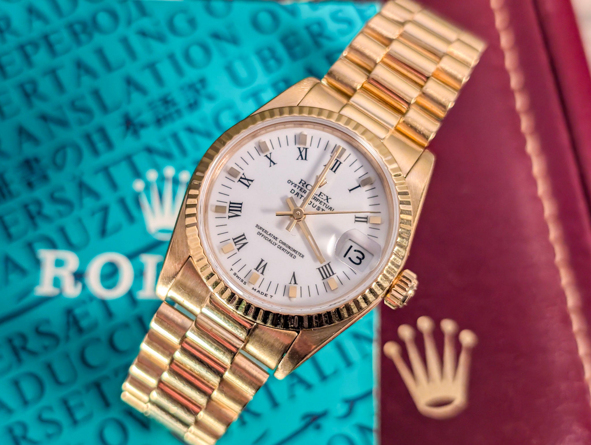 Rolex Datejust 68278 President 18K Yellow Gold White Roman Dial Ladies 31mm – Box & Papers